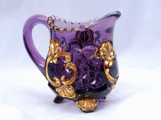 Elegant Amethyst Glass Pressed Glass Creamer with Gold Trim