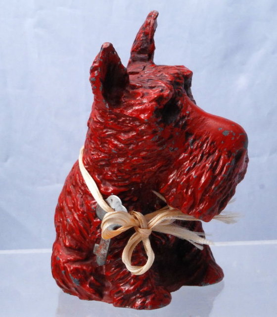 VINTAGE METAL RED PAINT SCOTTI DOG COIN BANK WITH KEY.