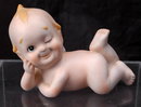 Lefton Bisque Piano Baby