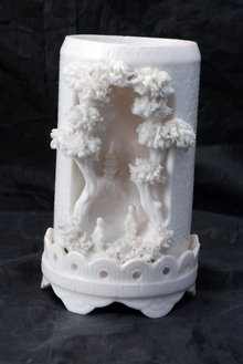VINTAGE JAPANESE WHITE PORCELAIN VASE, MOLDED NATURAL LANDSCAPE